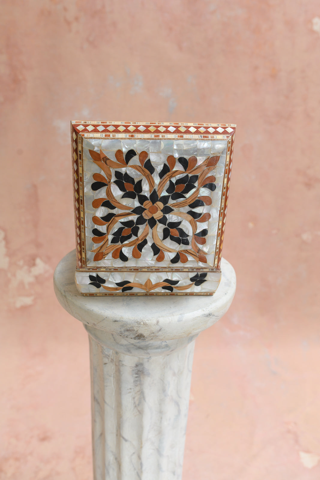 Front view of Damascus keepsake box with black and wood petal burst medallion