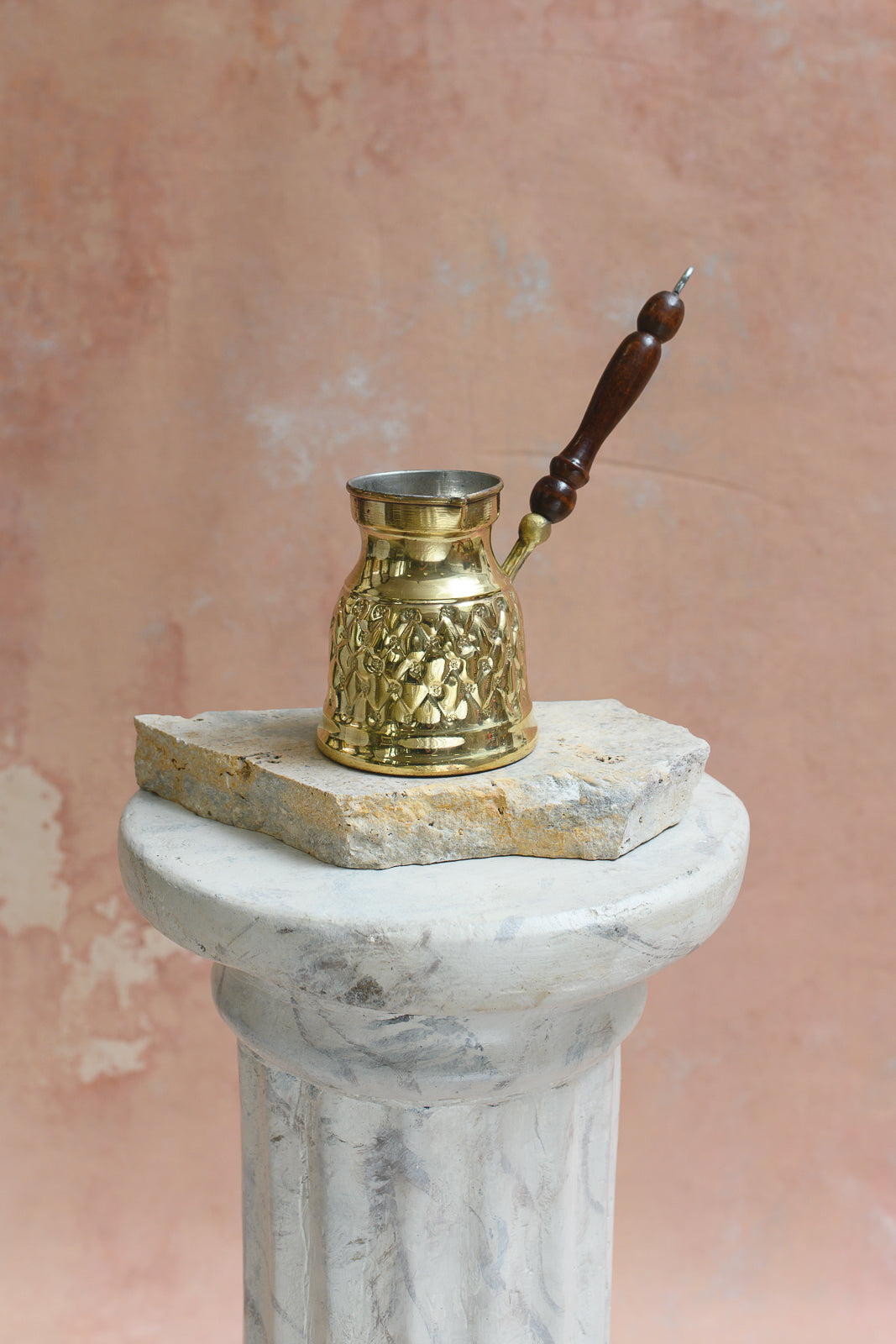 Hand-etched brass Arabic coffee pot with vine pattern and wood handle