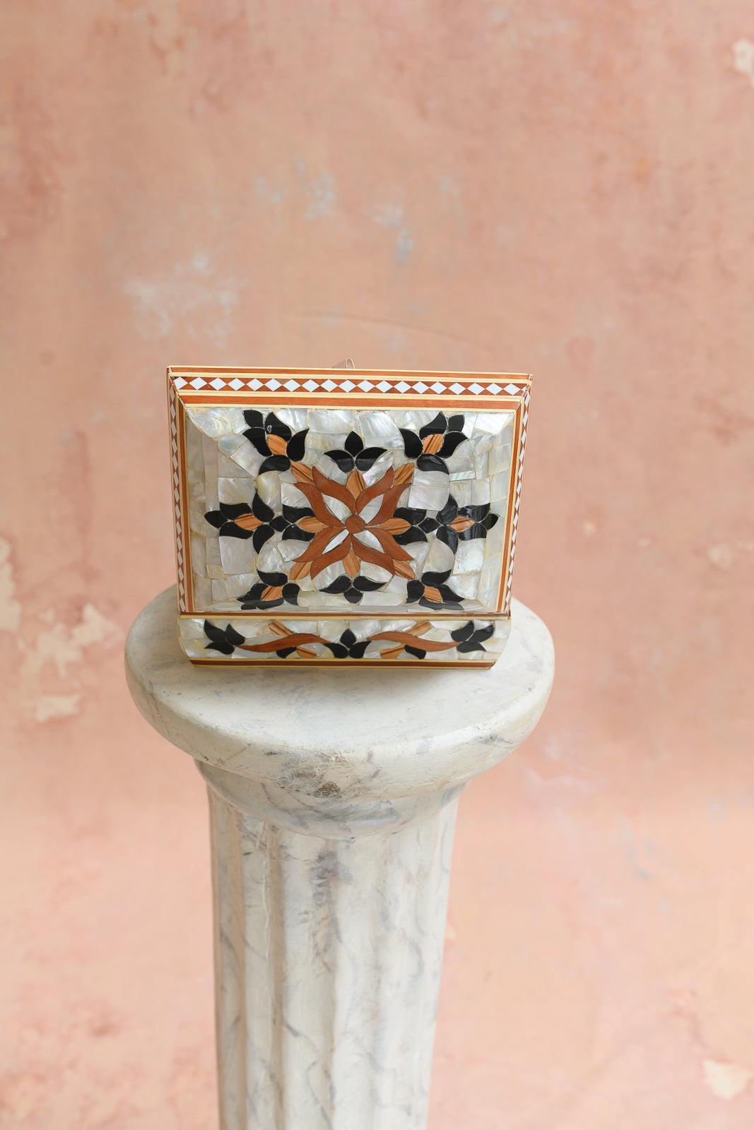 Front view of Damascus keepsake box with black and wood petal medallion