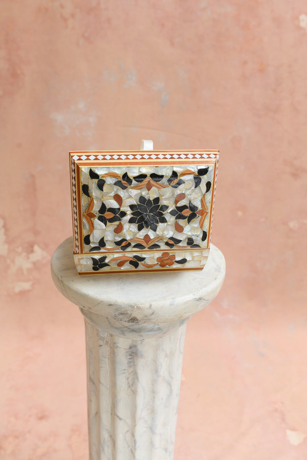 Front view of Damascus keepsake box with black lotus medallion inlay