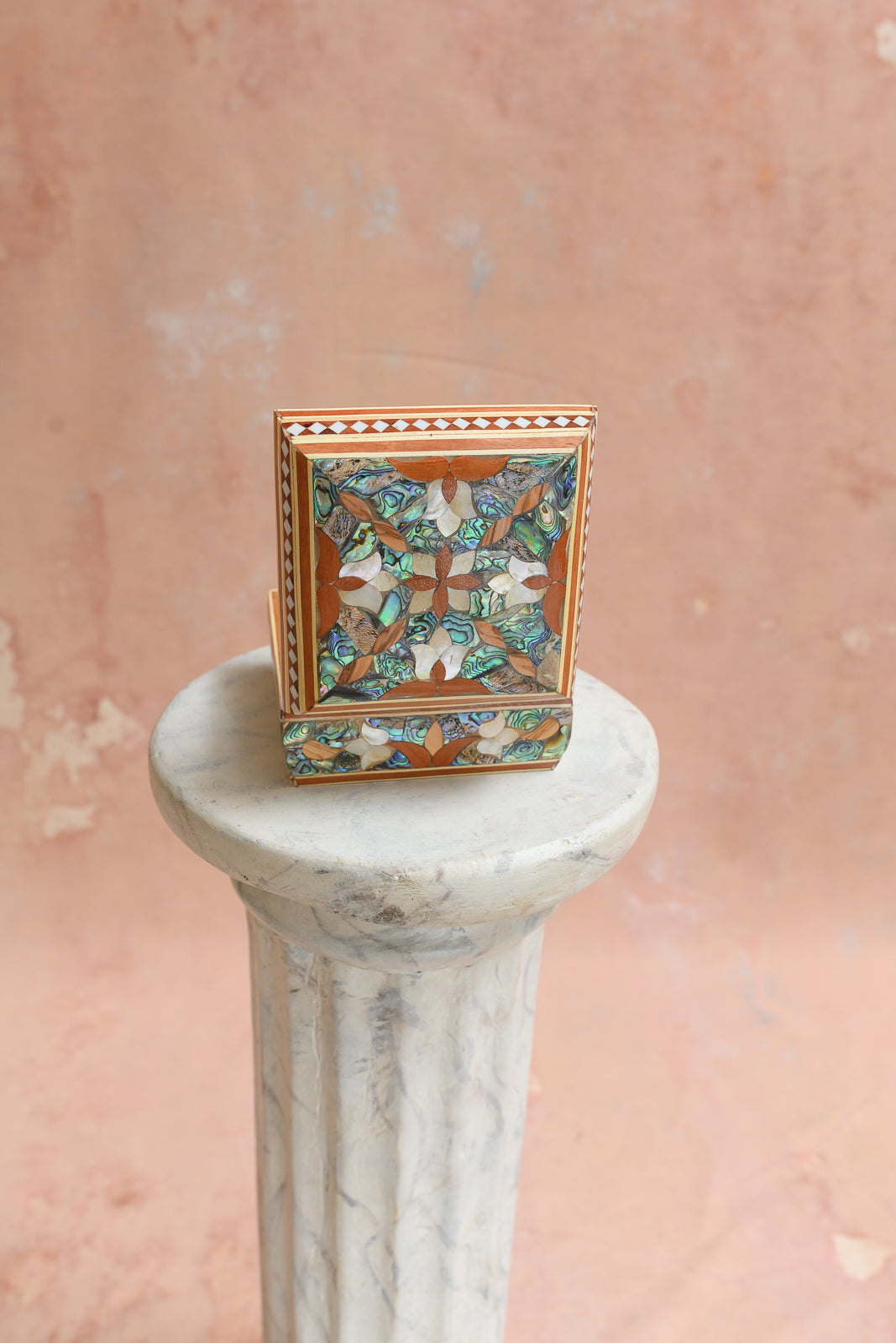 Front view of Damascus keepsake box with abalone kaleidoscope inlay