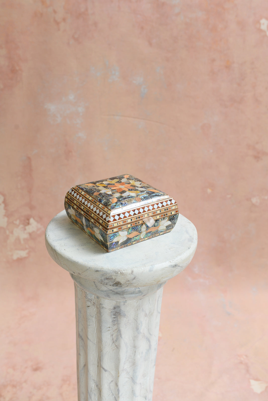 Front view of Damascus keepsake box with floral medallion and diamond trim