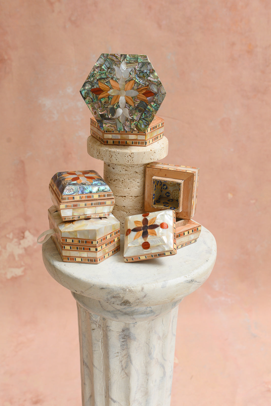 Damascus mother-of-pearl ring boxes and hexagon keepsake boxes shown together for scale