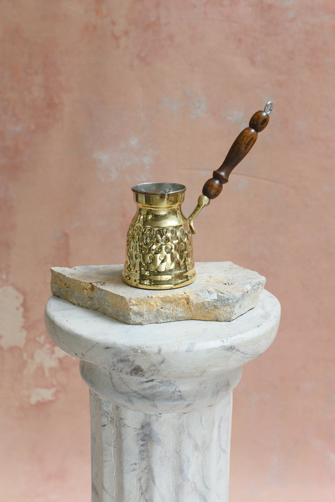 Hand-etched brass Arabic coffee pot with diamond pattern and wood handle