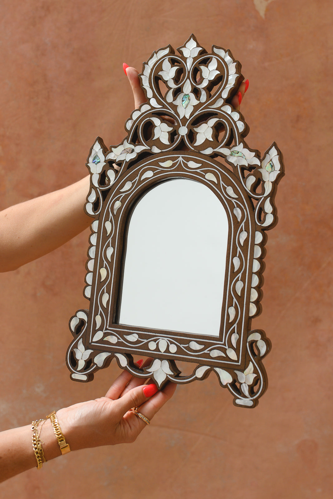 Damascus mother-of-pearl wall mirror with arched frame and pierced fretwork crown