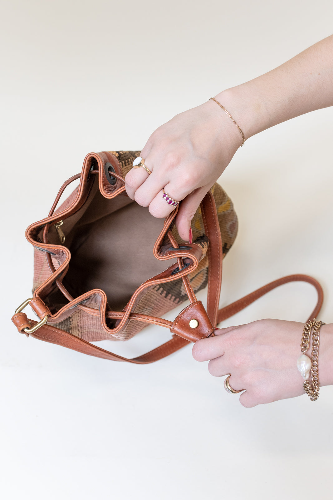 Braided leather bucket bag with a unique design made in Paris. French  leather goods. – Suki-paris